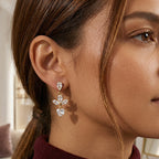 gold plated marquise flower clear stone drop earring worn on the ear