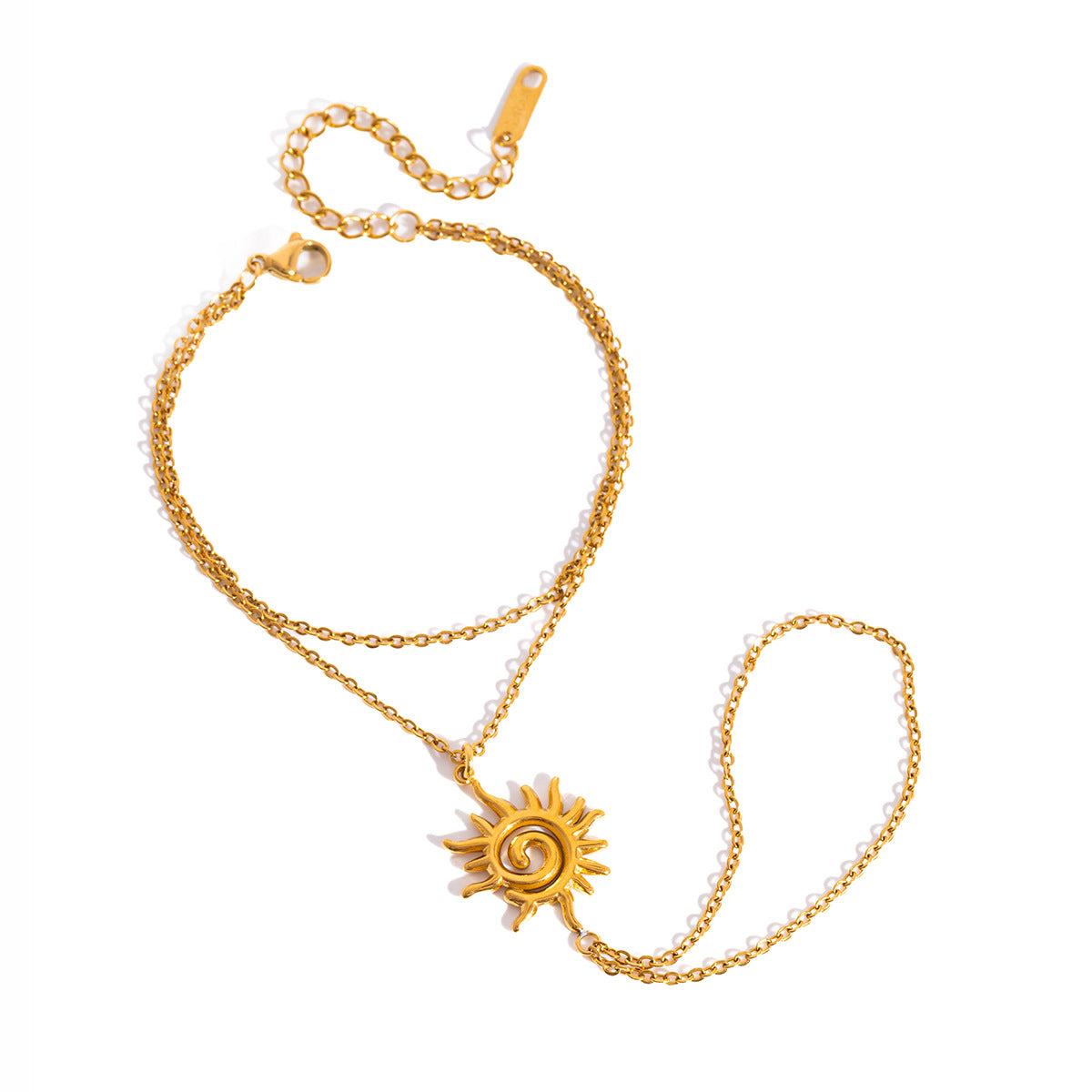 Gold-tone sun hand chain on white