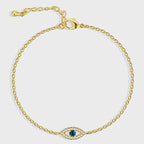 gold plated blue evil eye station bracelet on white