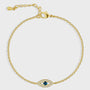 gold plated blue evil eye station bracelet on white