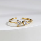 gold plated brass open ring with triangle and round clear zirconia