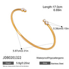 Twisted open cuff with clear tips