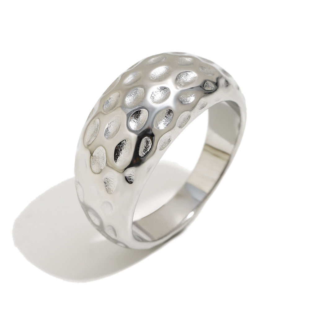 isolated silver-finish stainless steel hammered dome ring