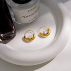 pair of gold plated half-moon clear-stone hoop earrings