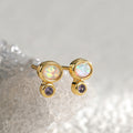 gold plated synthetic opal and purple stone stud earrings