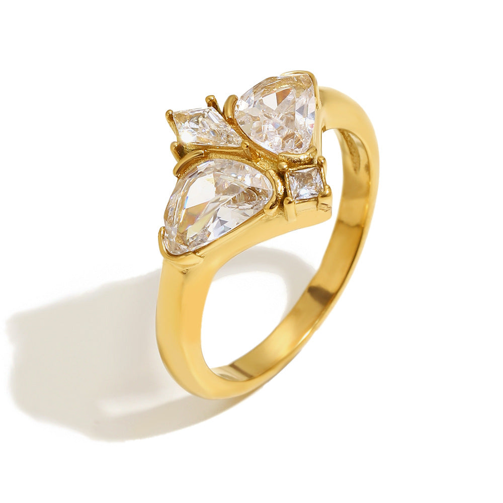 isolated gold plated stainless steel butterfly cocktail ring