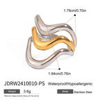 Two-Tone Sculptural Stainless Steel Ring Collection — styled view of the ring assortment