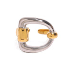 Isolated two-tone rounded-square stainless steel ring
