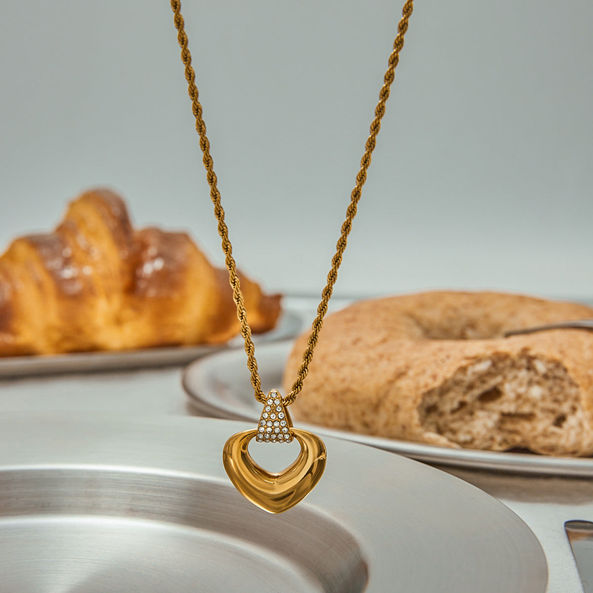 Gold-Tone Stainless Steel Heart Necklace Collection — detail view