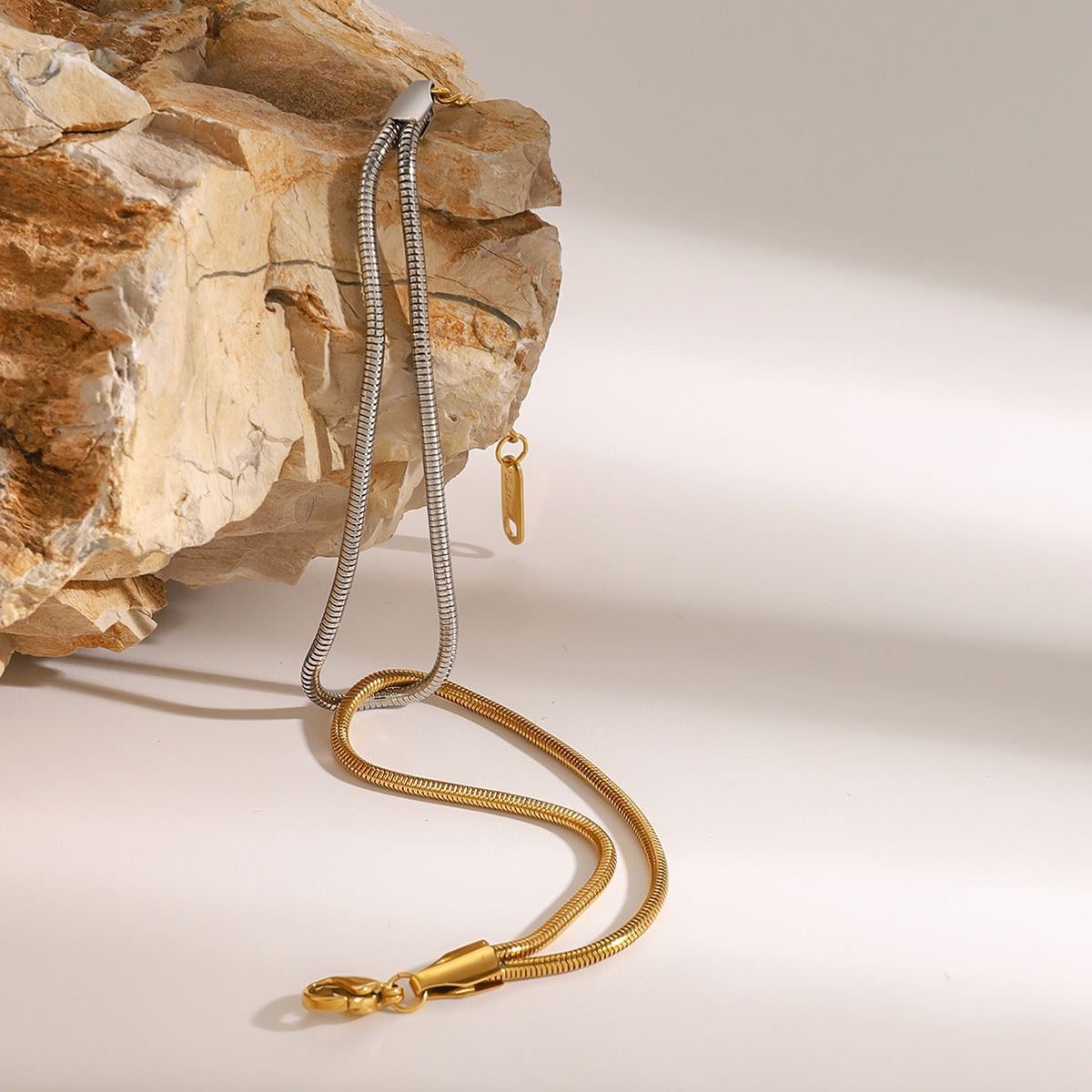 Two-Tone Wave Stainless Steel Link Bracelet — styled view