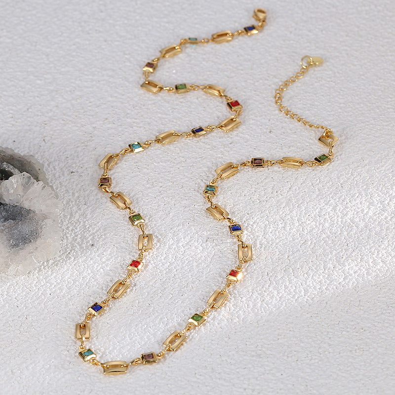 full multicolor square link necklace arranged on a light surface