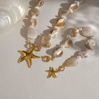 Necklace and bracelet displayed together on fabric