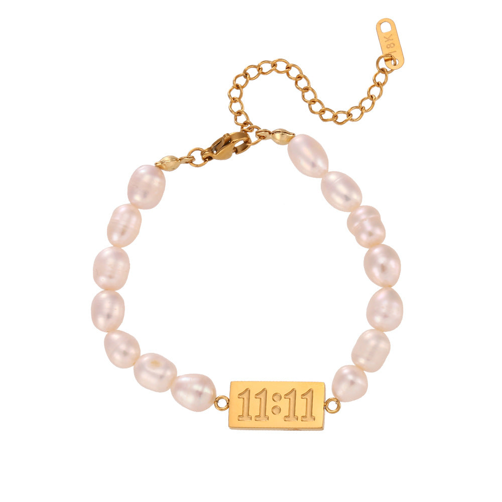 11:11 freshwater pearl bracelet with lobster clasp and gold-tone fittings