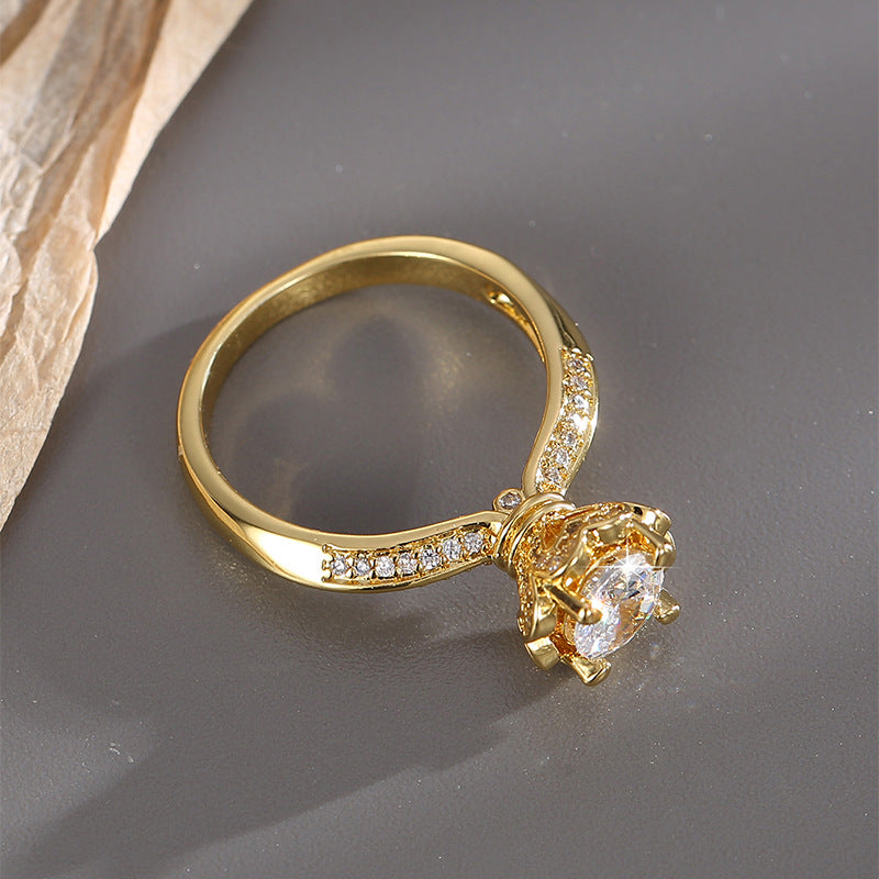rear angle of gold plated solitaire ring showing raised setting