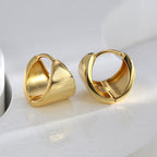 pair of gold plated sculptural shield hoop earrings