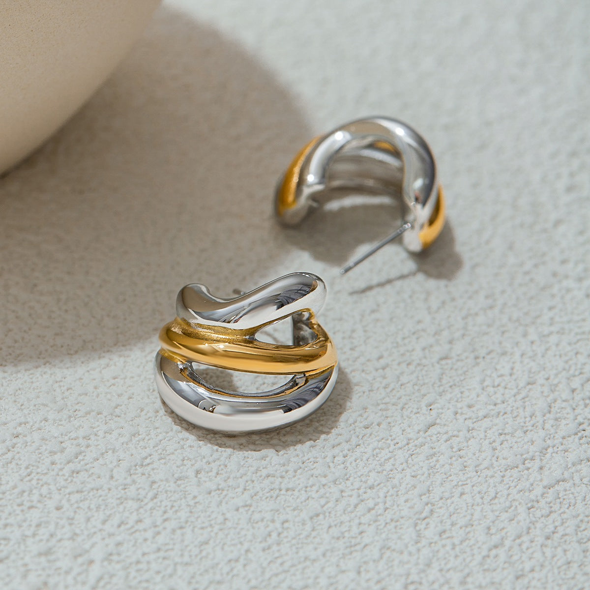 Two-Tone Layered Stainless Steel Huggie Hoop Earrings – close-up view