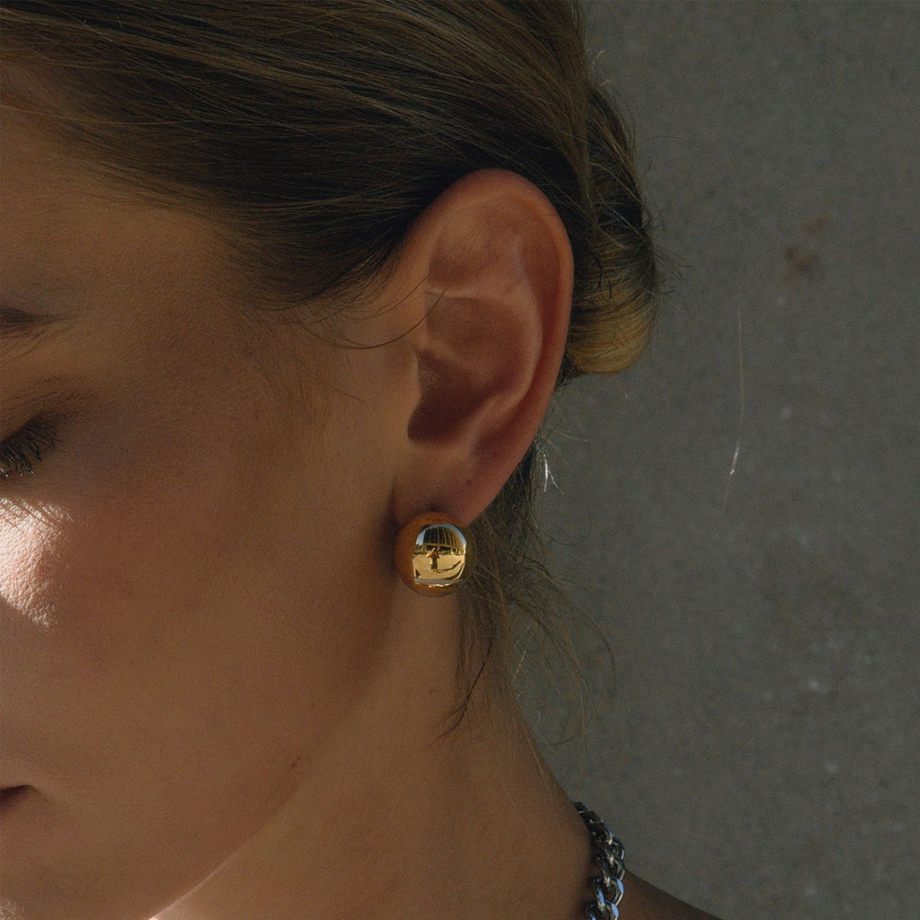 Two-Tone Half-Dome Stainless Steel Stud Earrings styled product view