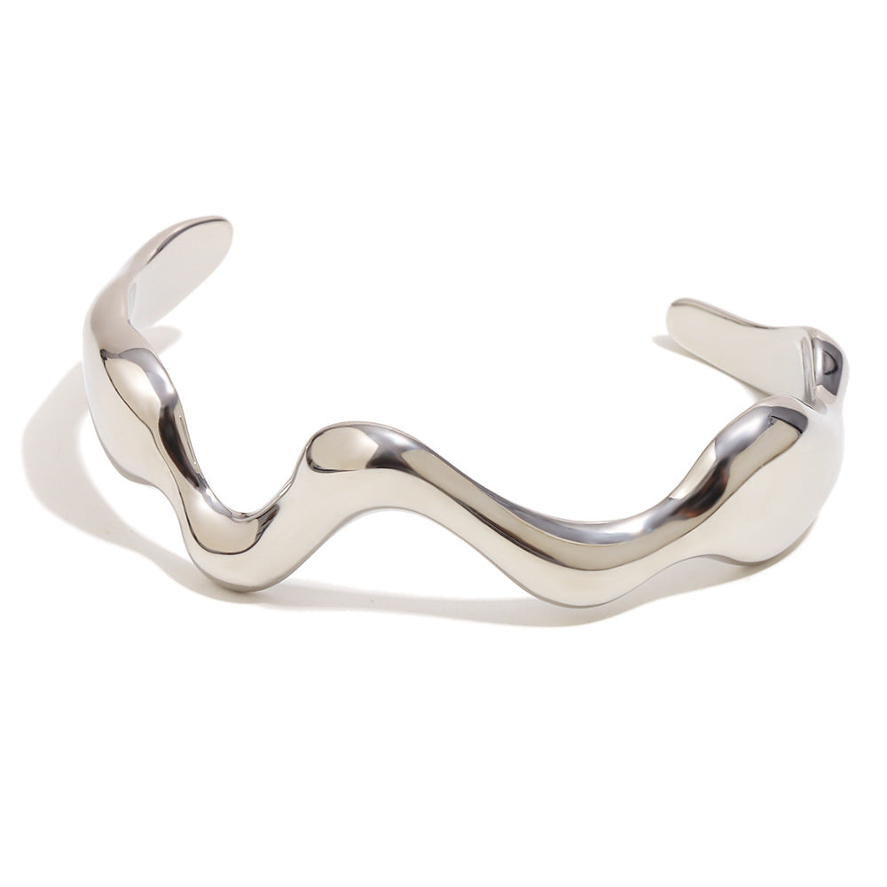 silver-finish irregular wave cuff with broad rounded ends