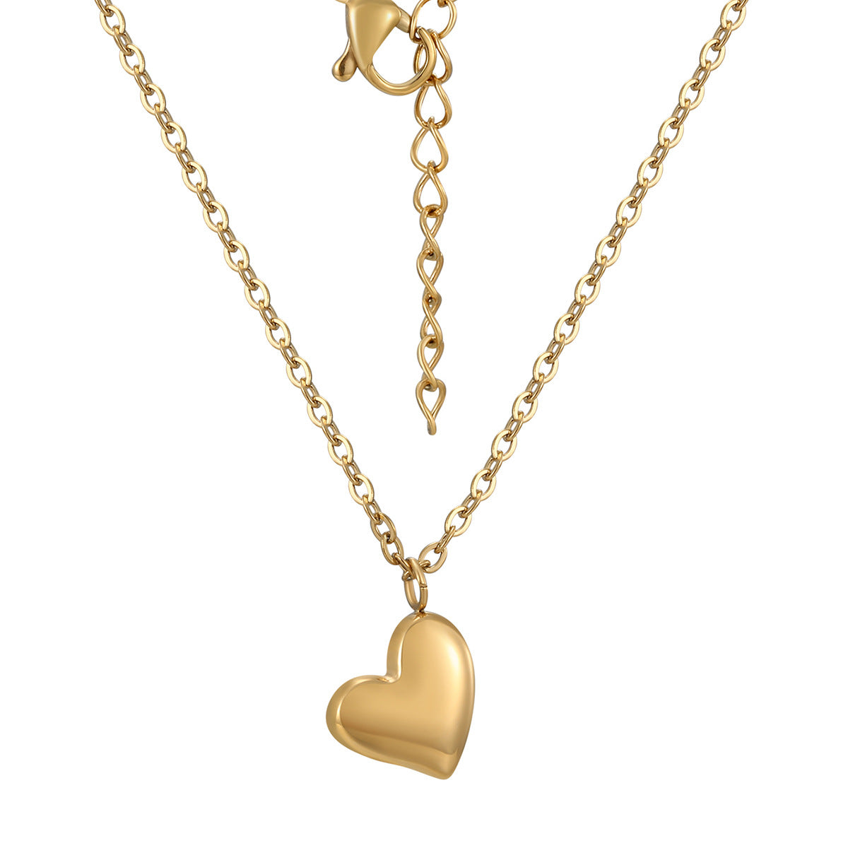 front detail of the smooth sculptural gold plated heart pendant