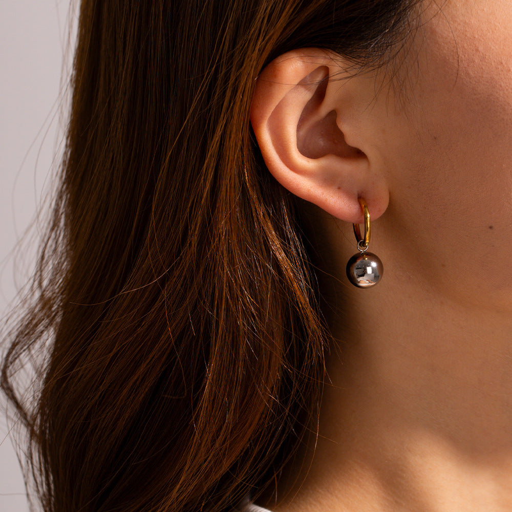 Mixed-Finish Stainless Steel Sphere Drop Hoop Earrings on-model view