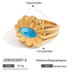 Gold-Tone Blue Zircon Floral Stainless Steel Ring – detail view