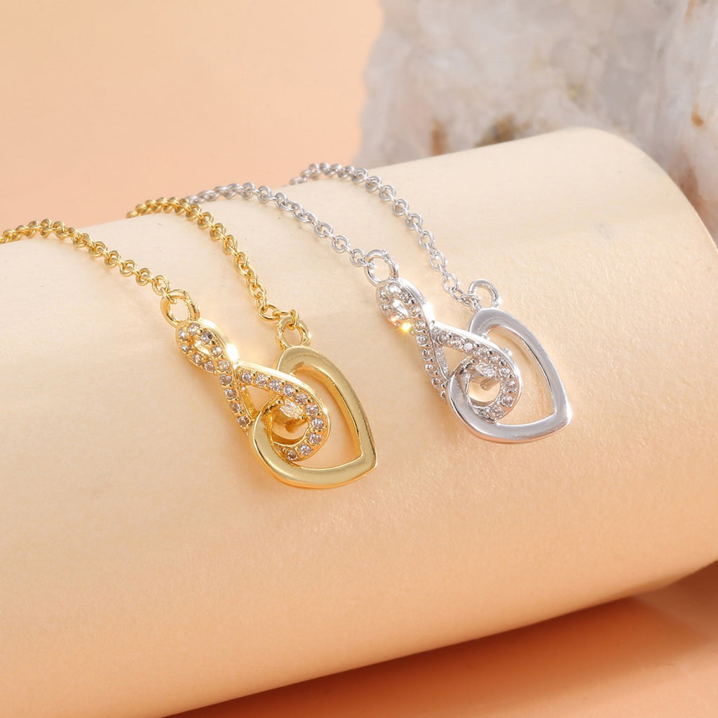 infinity heart necklaces with clear stone accents in two finishes