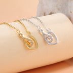 infinity heart necklaces with clear stone accents in two finishes