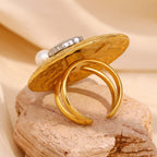 side view of the chunky open band beneath the ocean motif face