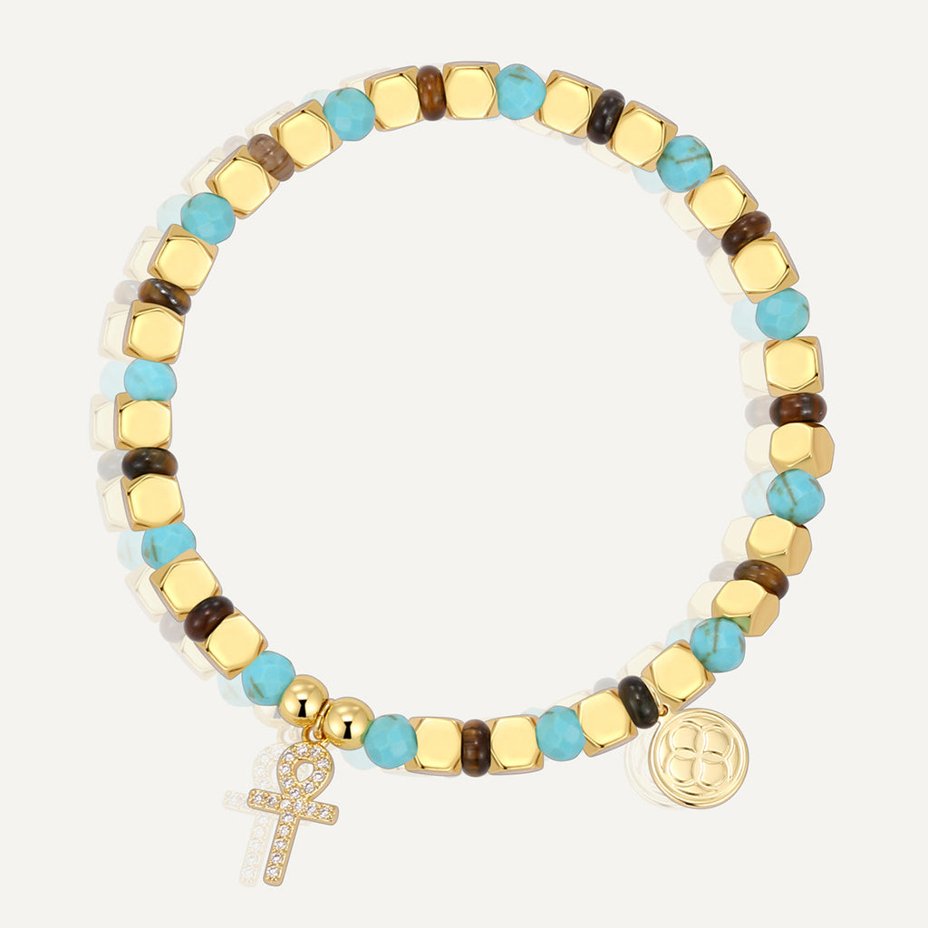 gold plated cross bracelet with turquoise-color and tiger's eye beads