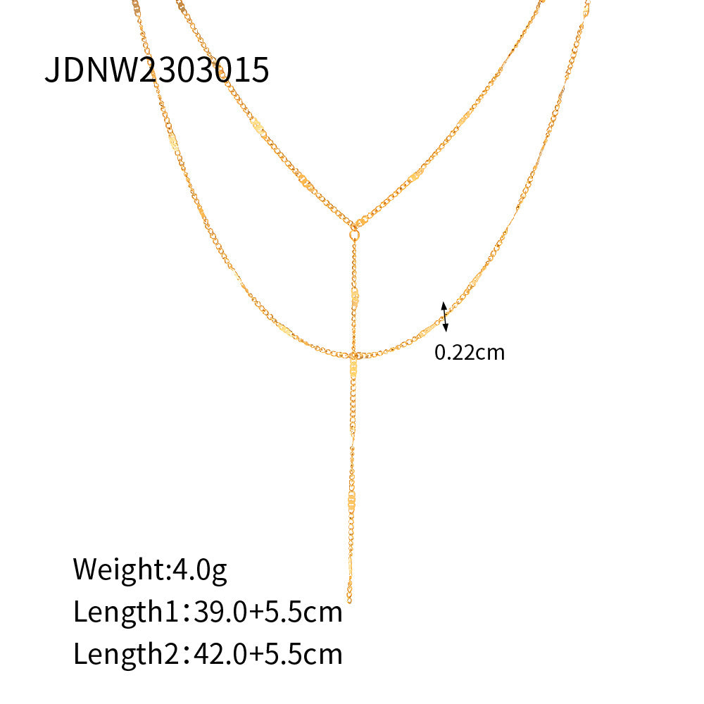 Two-Tone Stainless Steel Earrings and Lariat Necklace Collection — scale reference