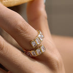 Offset rows of clear stones on a finger