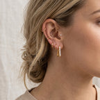 Trapezoid hoops shown in a side styling view