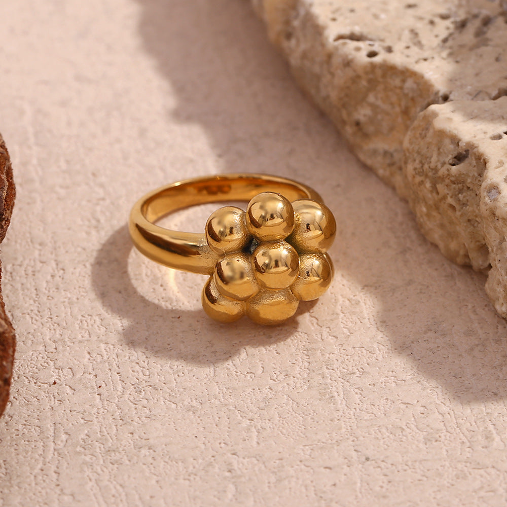 gold plated stainless steel ring with a sculptural bubble cluster