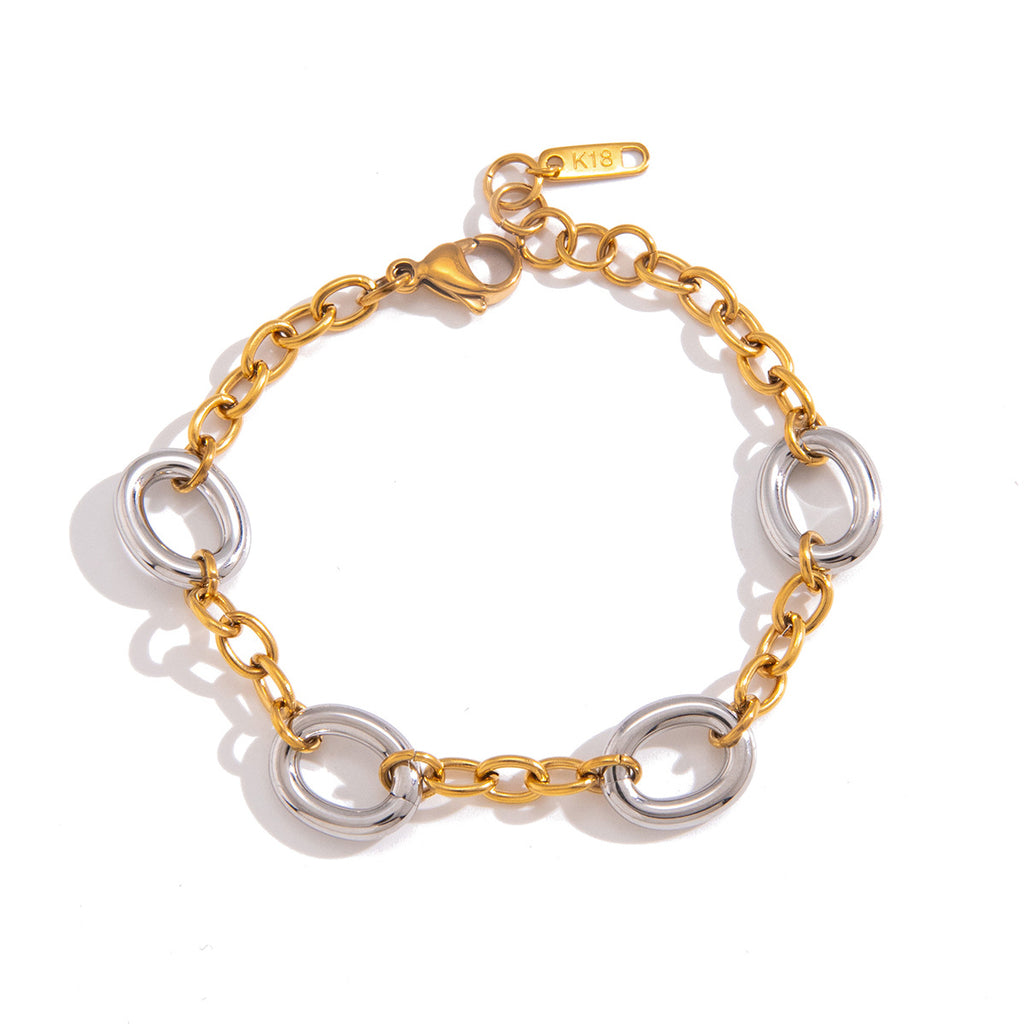 Two-tone stainless steel bracelet with clasp visible