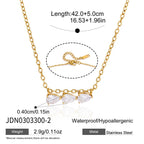 Three sideways pear-shaped stones on a short necklace bridge