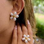 Flower stud earrings and the separate flower ring worn together