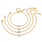 Four solitaire bead-chain bracelets on white