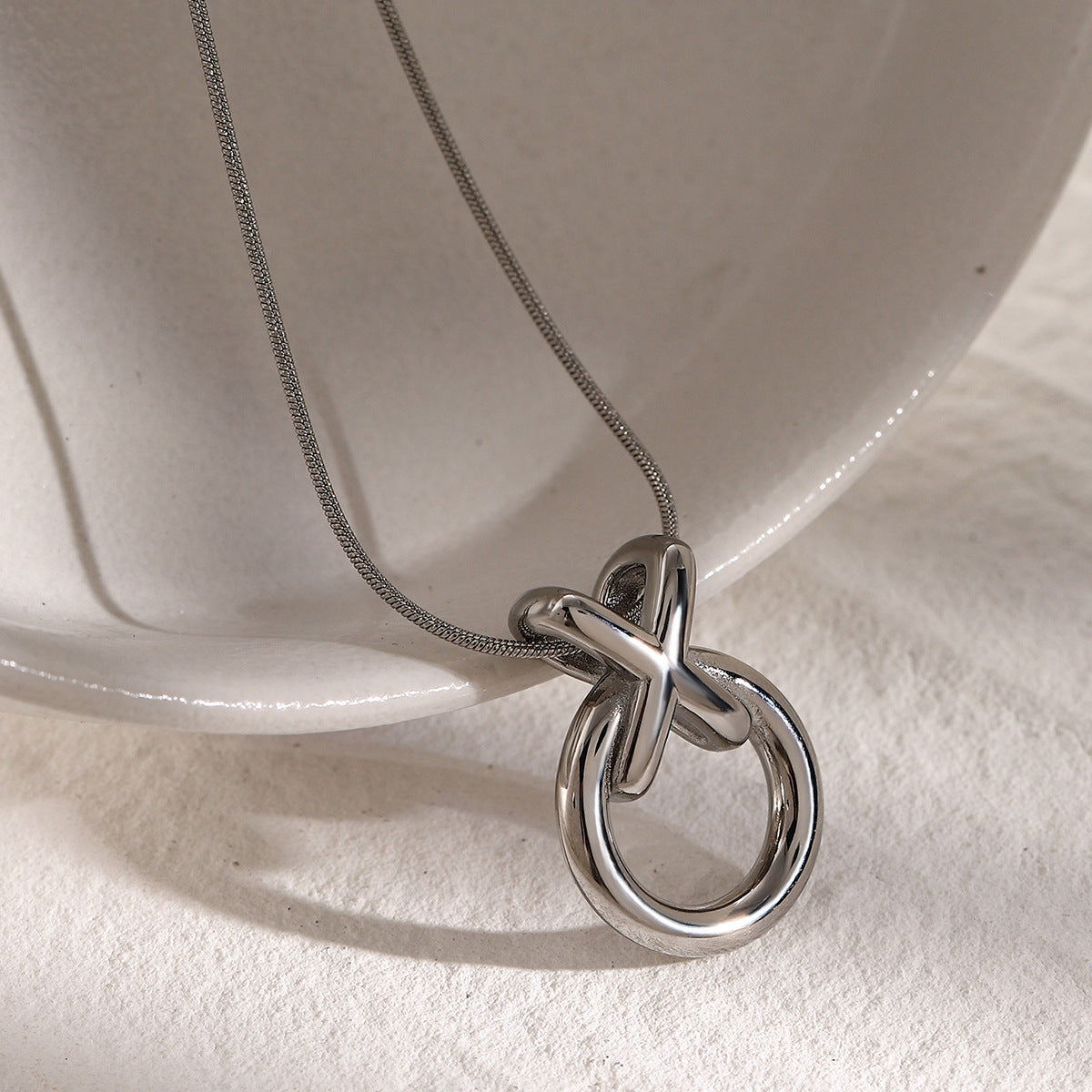 Interlocking Circle Stainless Steel Pendant Necklace Collection styled product view