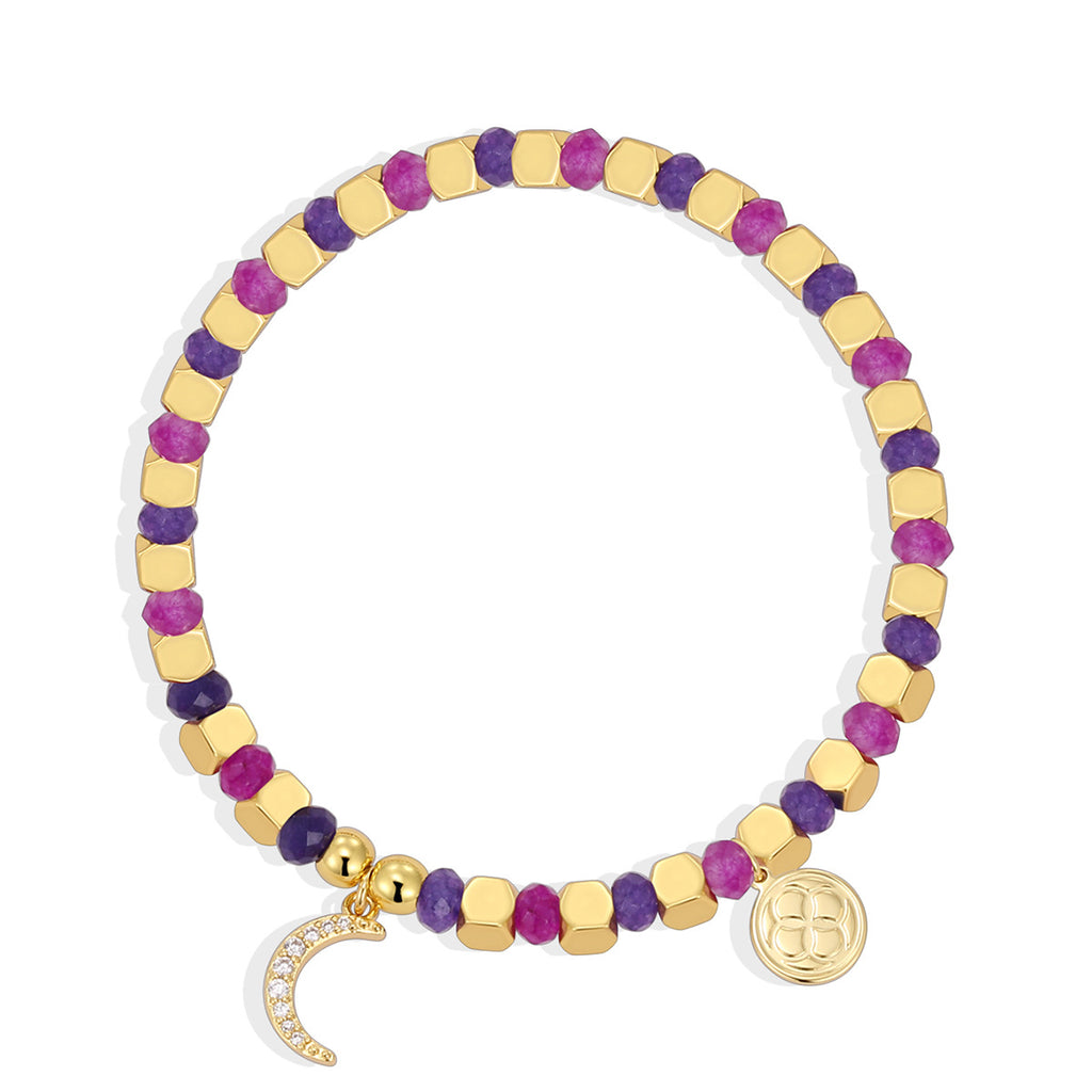 isolated purple and magenta bracelet with clear stone crescent charm