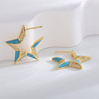 open star stud earrings with blue resin and clear zirconia details