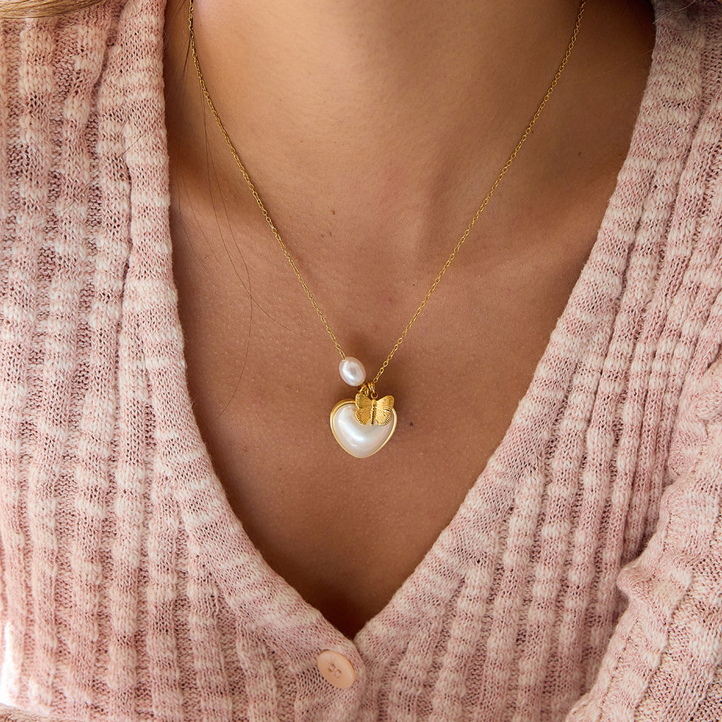 Separate heart necklace shown as a styling companion, not included