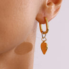 Gold-Tone Heart Charm Stainless Steel Hoop Earrings styled product view