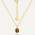 gold plated oval tiger's eye pendant necklace with extension chain