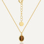 gold plated oval tiger's eye pendant necklace with extension chain