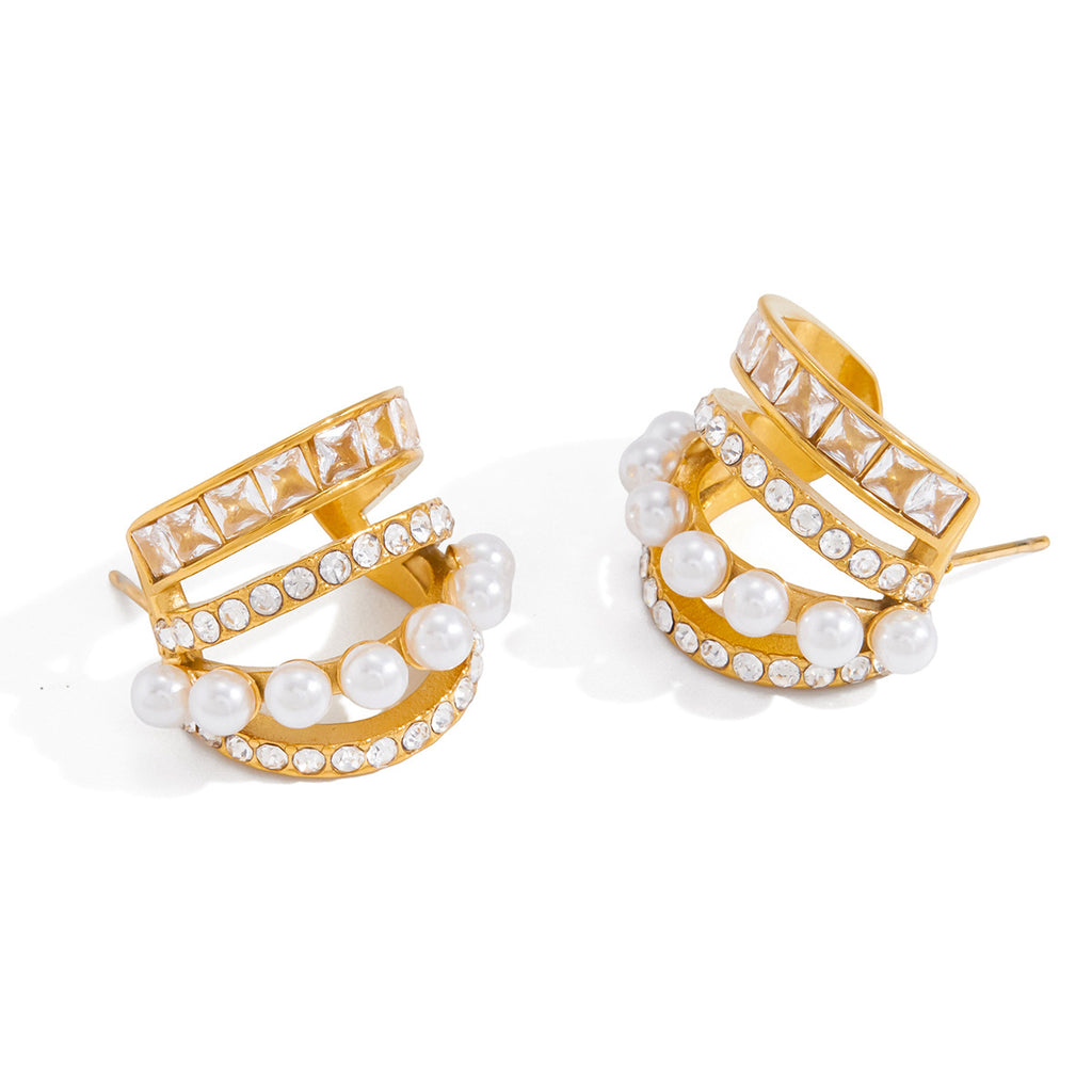 White-background view of the four decorative rows on the open hoop earrings