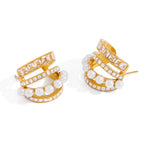 White-background view of the four decorative rows on the open hoop earrings