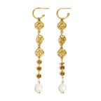 long medallion link earrings with white pearl tips on white