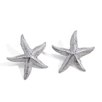 front and side views of stainless steel starfish stud earrings
