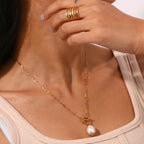 model wearing the gold plated freshwater pearl toggle necklace