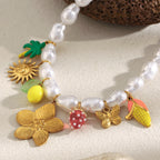Close-up of flower strawberry butterfly and palm-tree charms